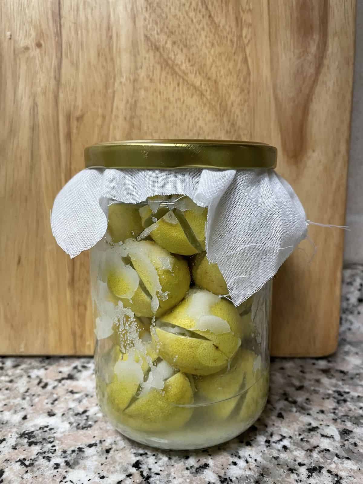 A jar of salted lime for preserving.