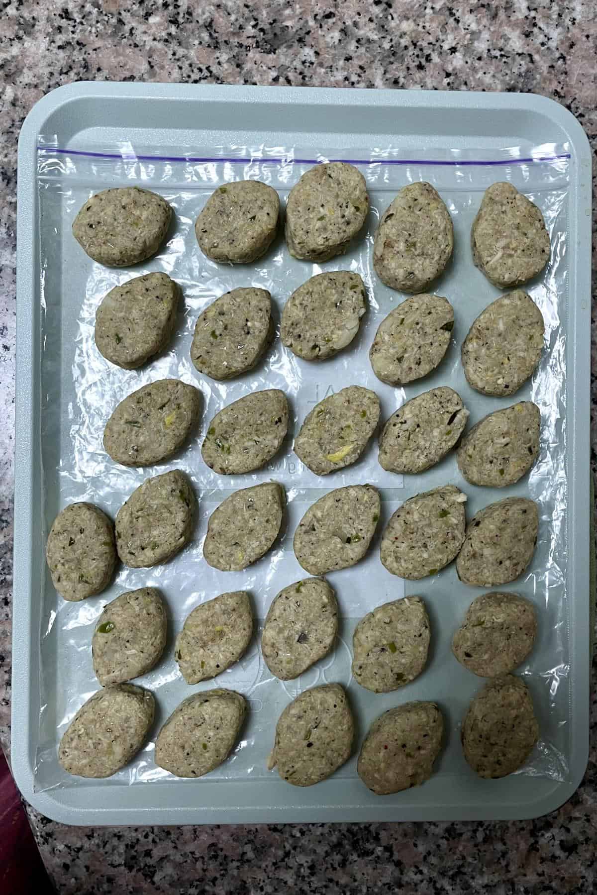 Double batch of chicken cutlet recipe shaped.