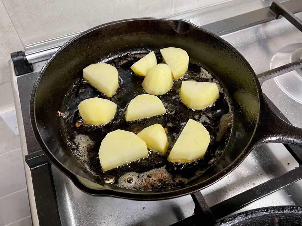 pan roasting potato chunks