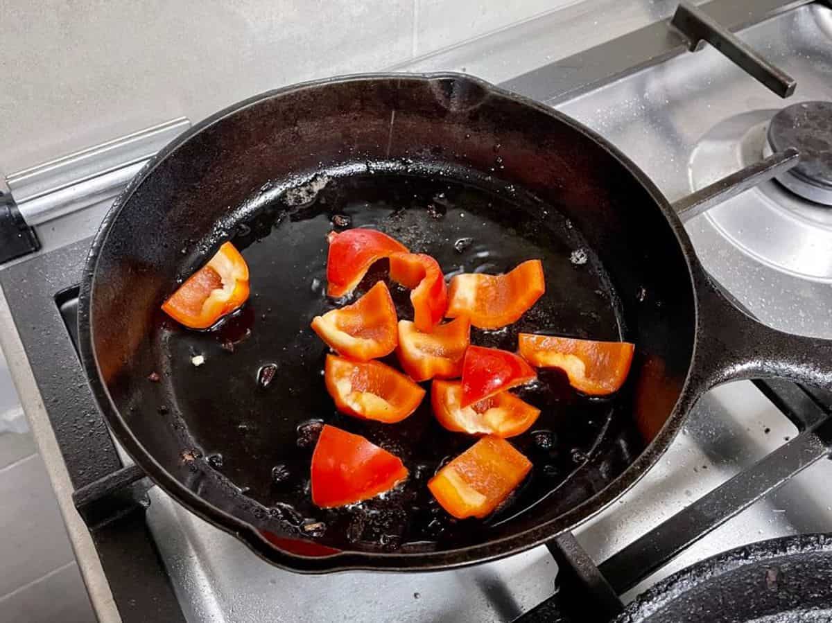 pan roasting red bell pepper pieces 