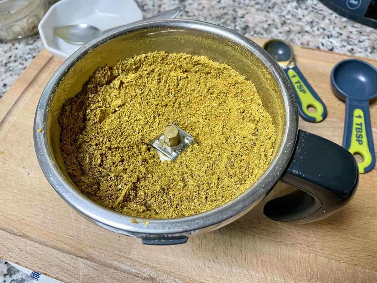 Ground up spices in a spice grinder.