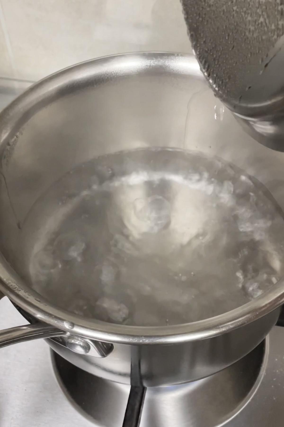 boiling water in saucepot