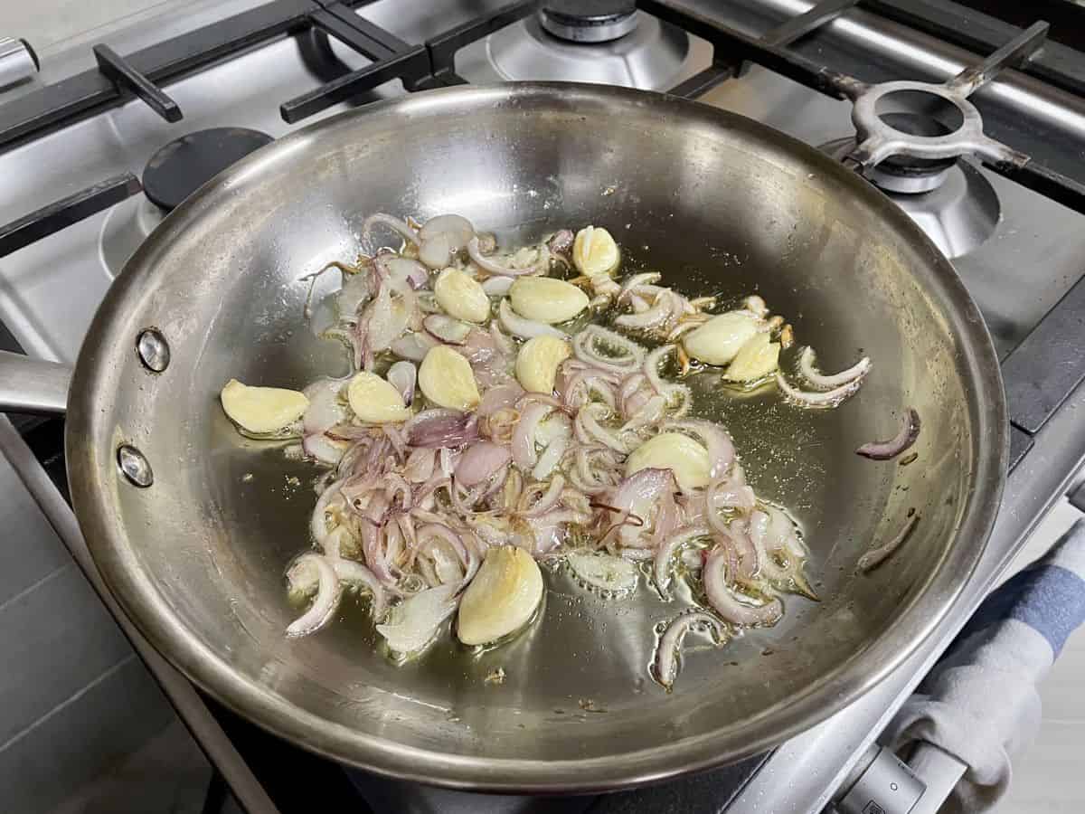 Sauteed onions and garlic cloves.