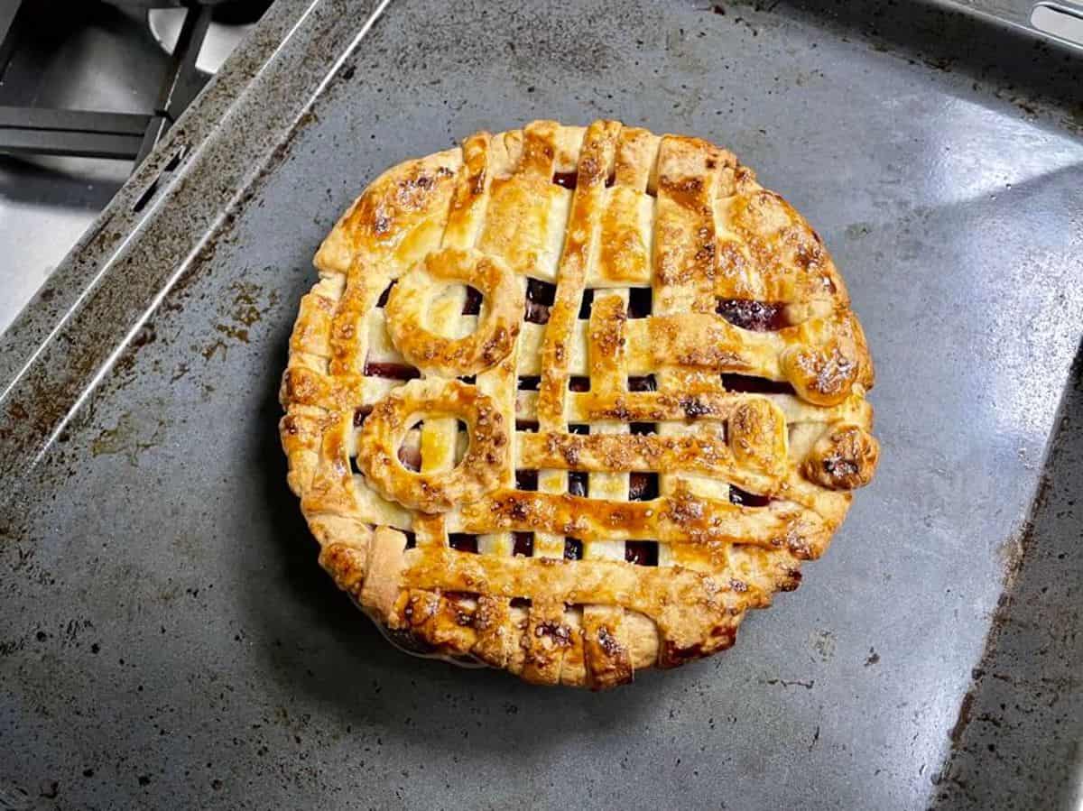 a fully baked oven-fresh cherry pie