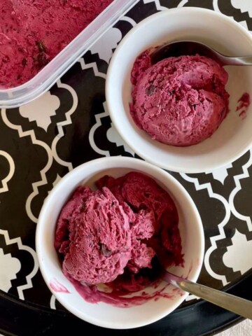 two bowls of blackberry ice cream