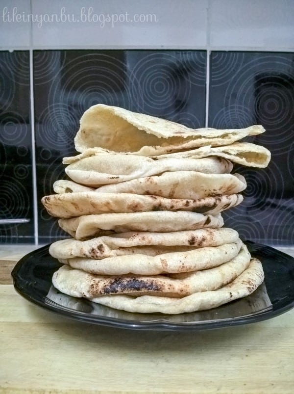 stack of homemade pita bread made without oven