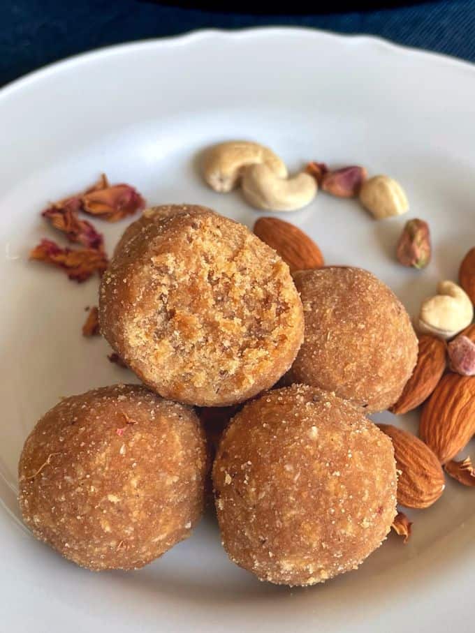 a stack of rice balls with one half bitten