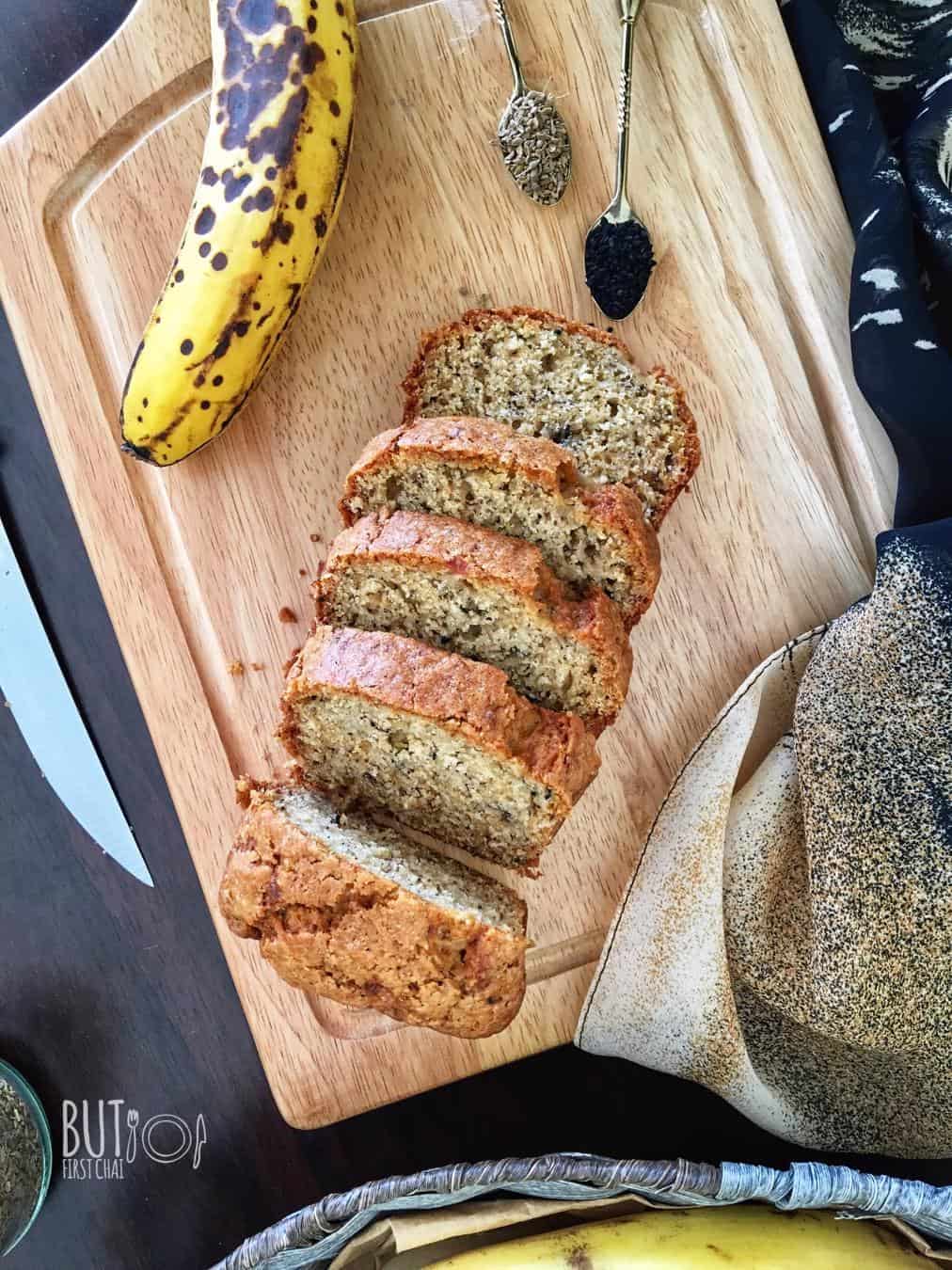 banana bread loaf with nigella seeds sliced