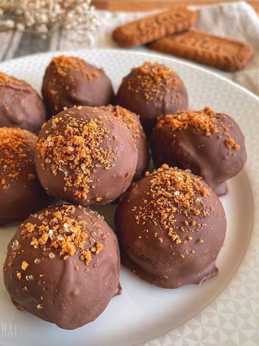 biscoff cookie truffles stacked and topped with more biscoff crumbles