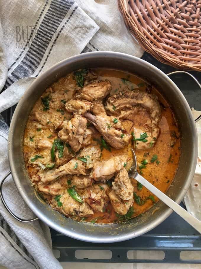 Chicken korma served in a wide pot