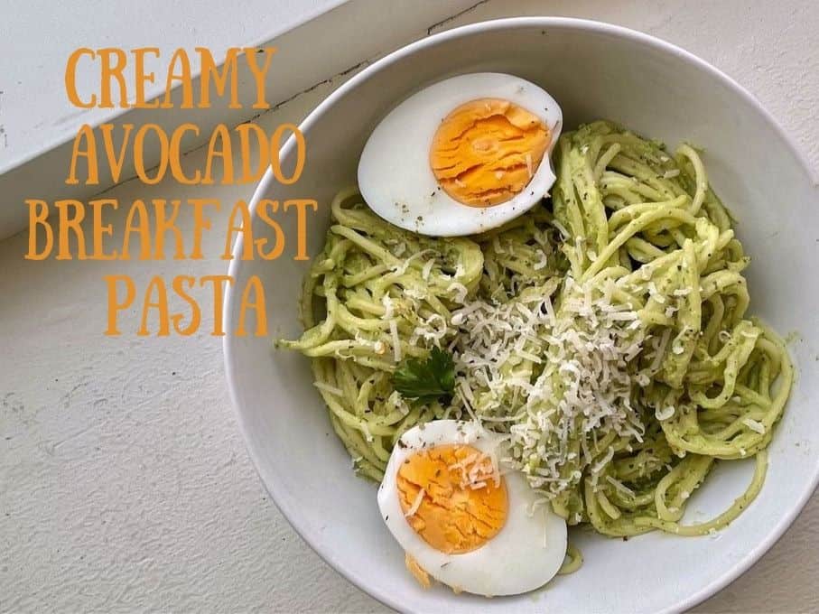 one bowl of avocado pasta with eggs and parm