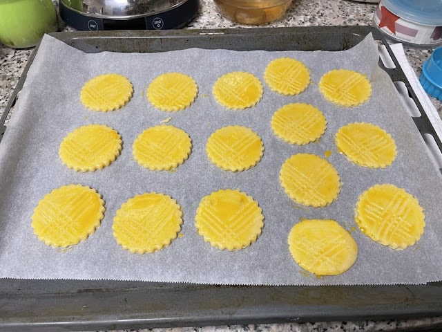 yolk brushed galettes bretonnes ready to be baked