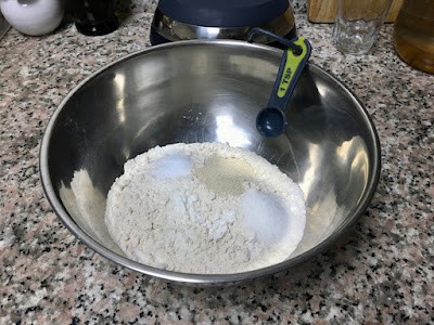 pizza dough dry ingredients in a bowl