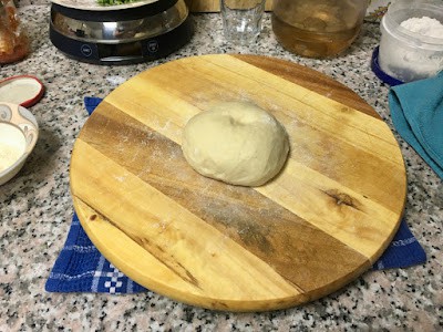 pizza dough ball ready to be rolled