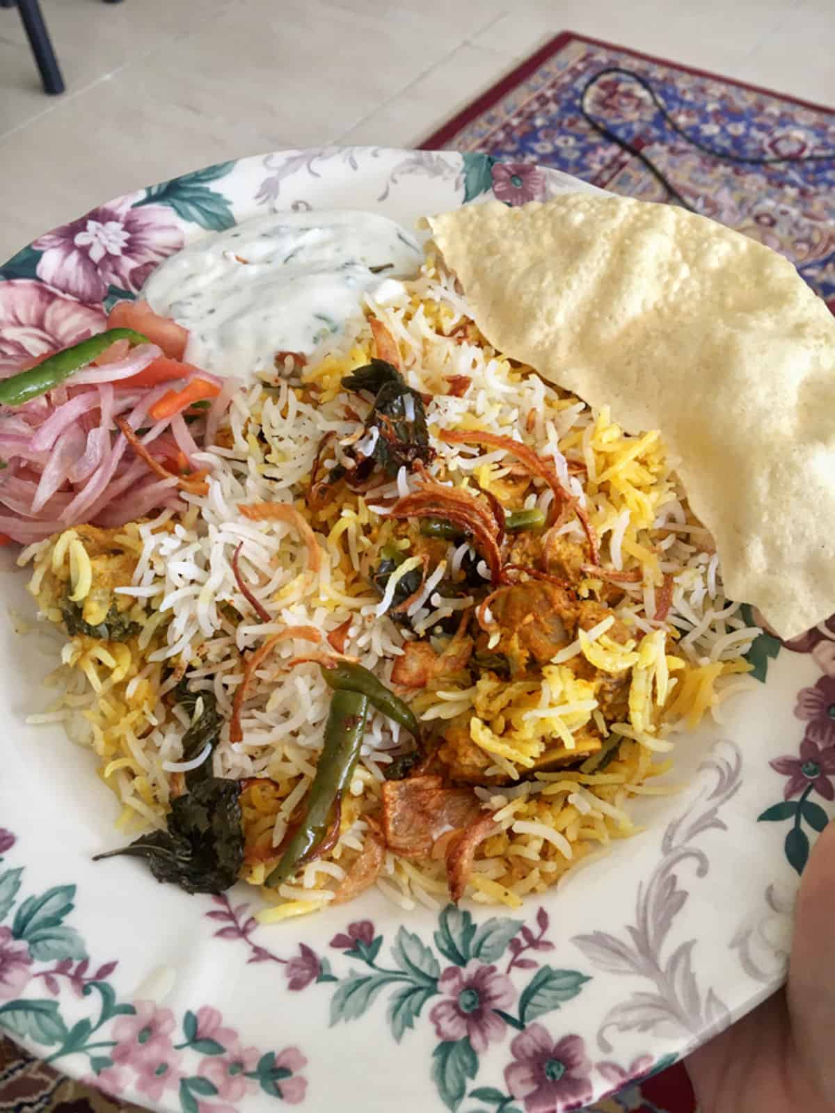 kacchi mutton biryani served in a plate