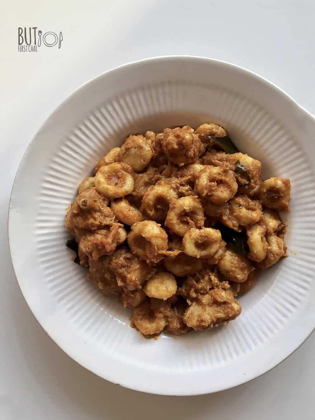 Mom's Kakka Orotti | Steamed Mini Rice Dumplings in Roasted Coconut Sauce Chicken Gravy