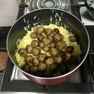 add the rice and meatballs back to the pot