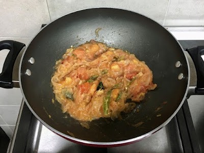 sauted and cooked tomatoes with onions