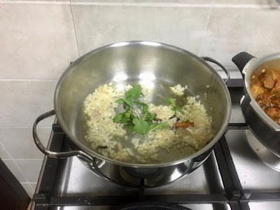 sauteing onions and mint leaves 