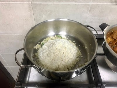 biryani rice added to the pot