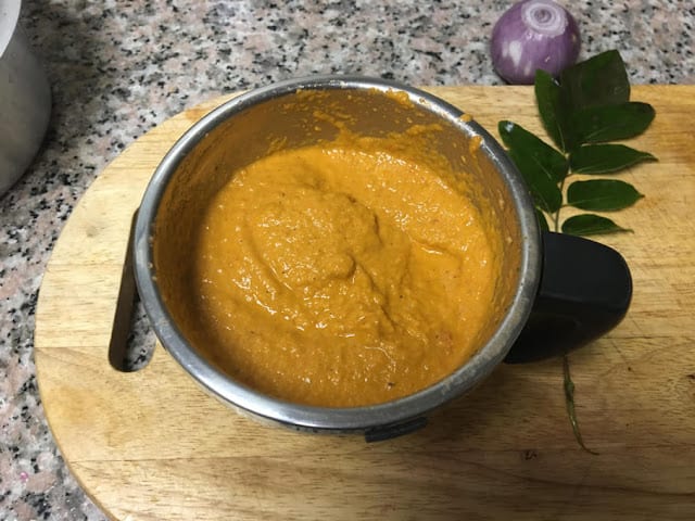 ground paste of roasted coconut and tomatoes