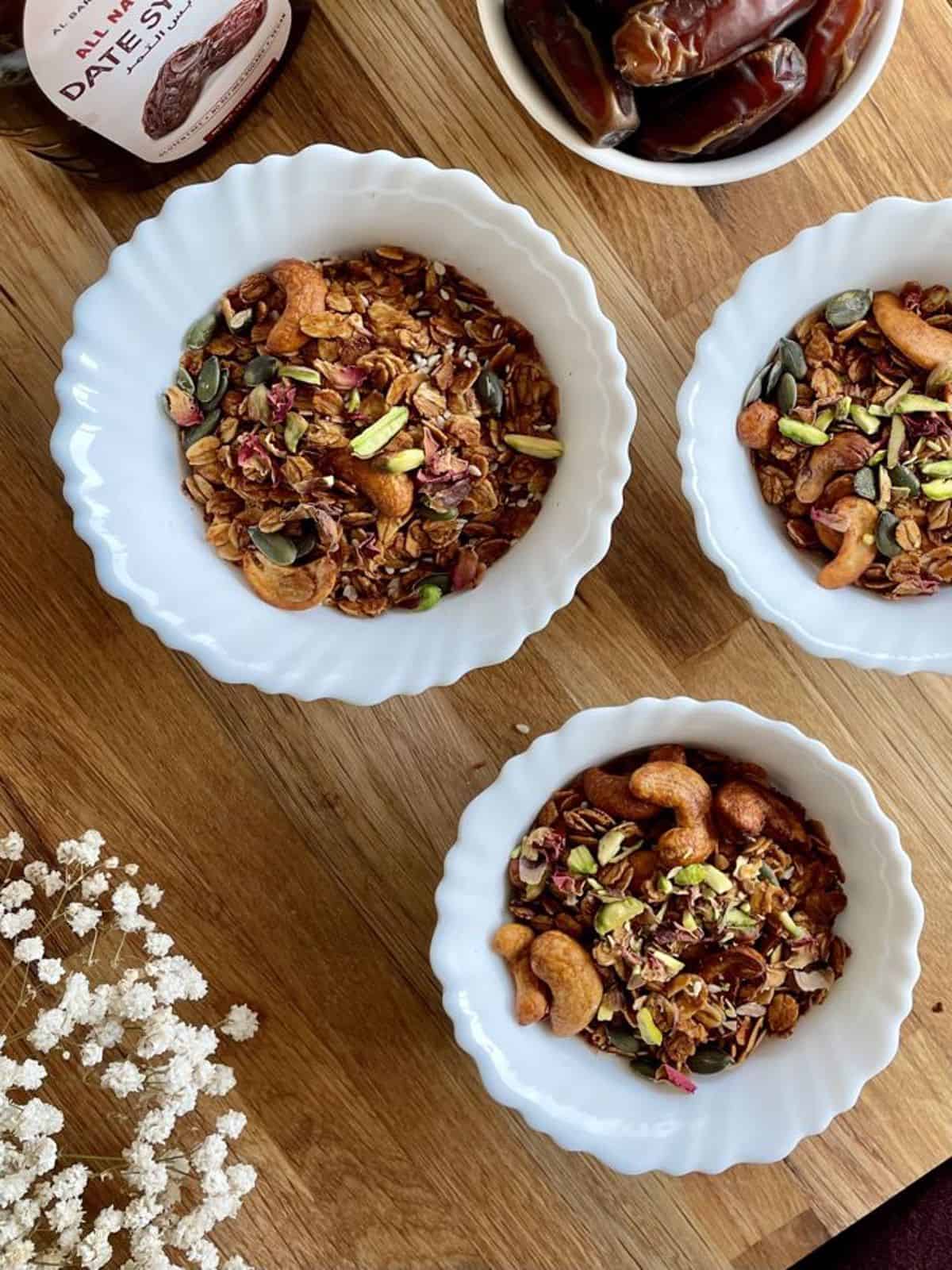 three bowls of granola 