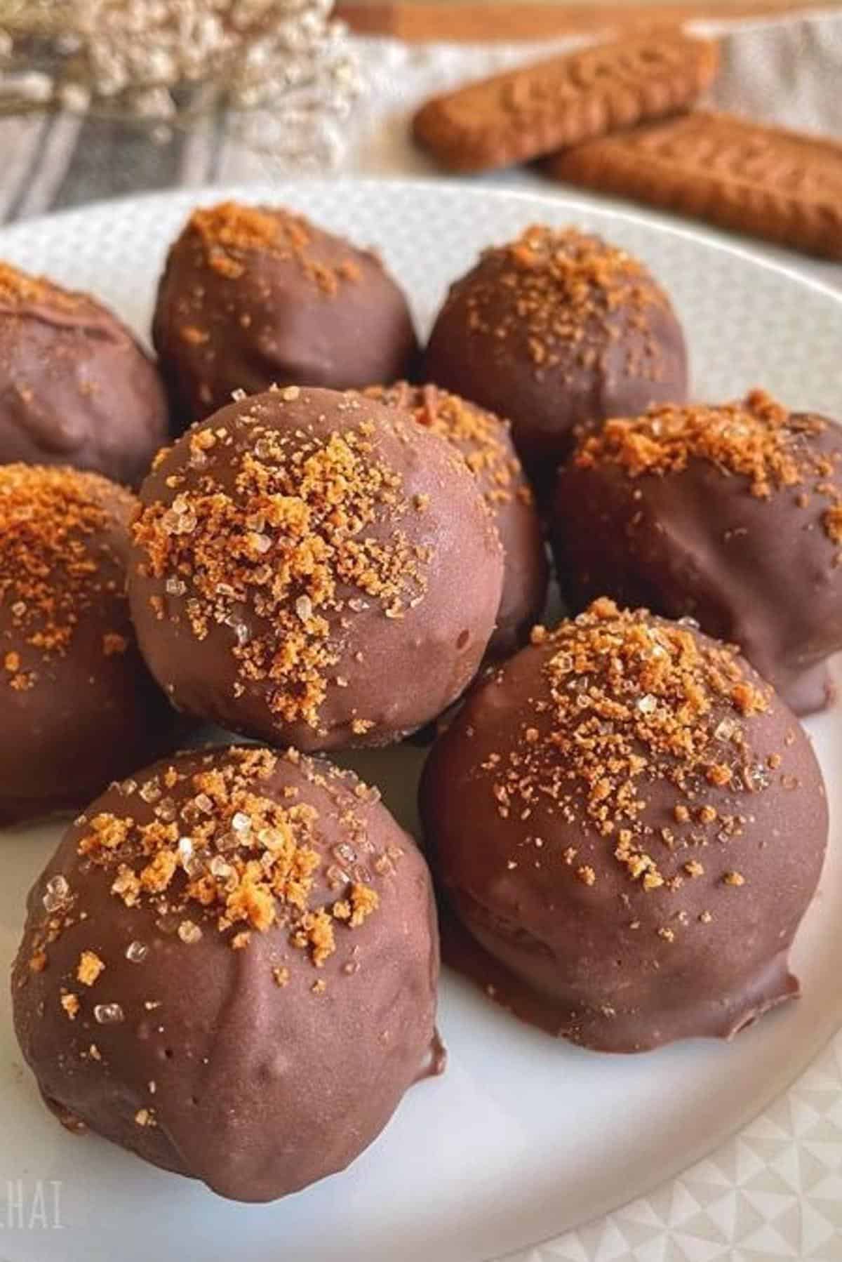 biscoff cookie truffles stacked and topped with more biscoff crumbles
