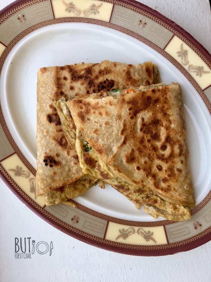 egg paratha sliced and served