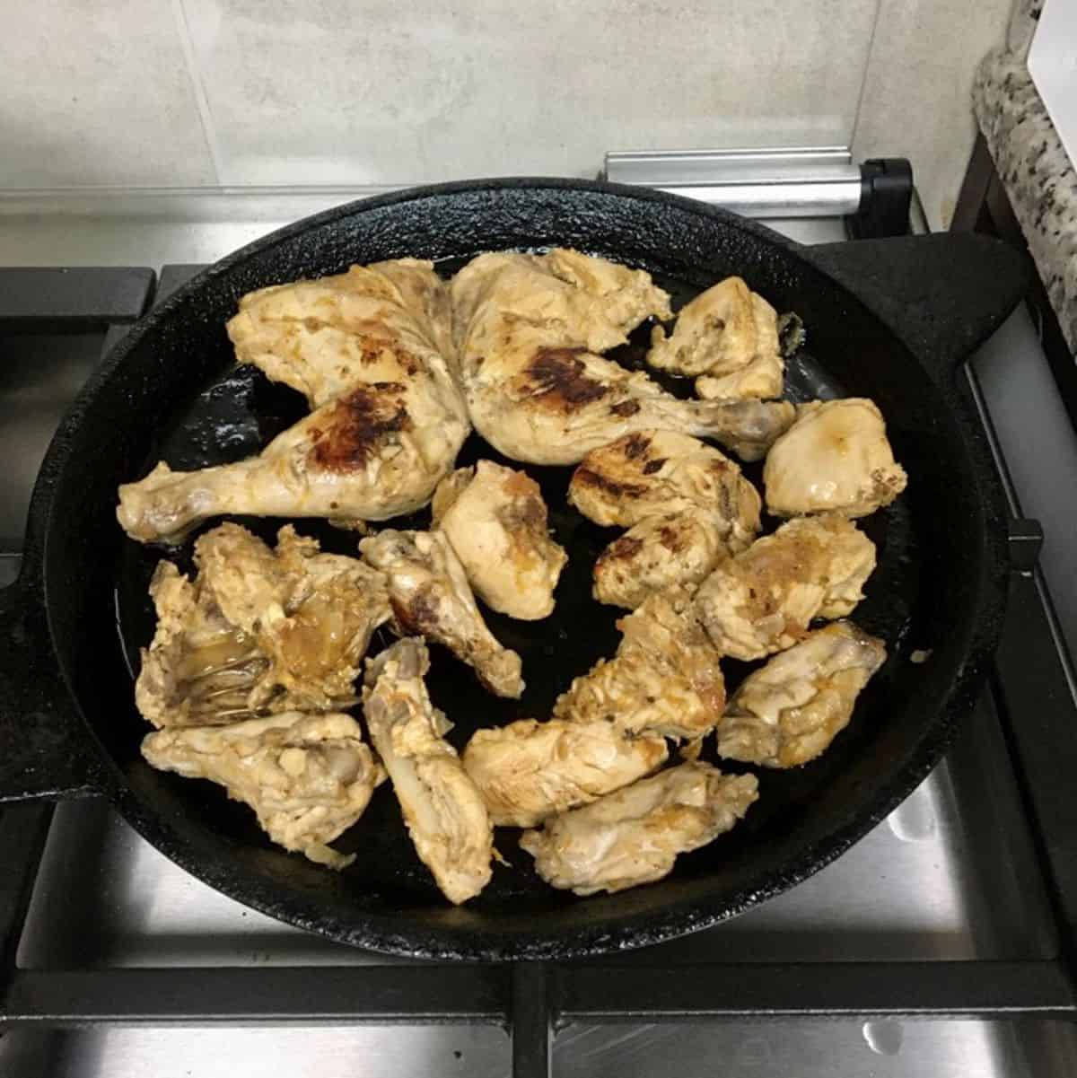 Pan roasting the kabsa chicken.