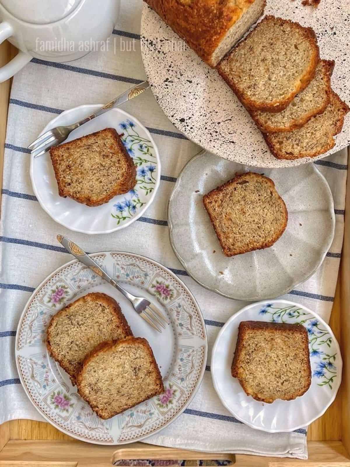 Two mini banana bread loaves sliced and served