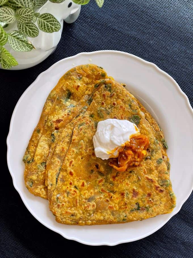 Fresh Fenugreek Leaves Flatbread served with yoghurt and pickle