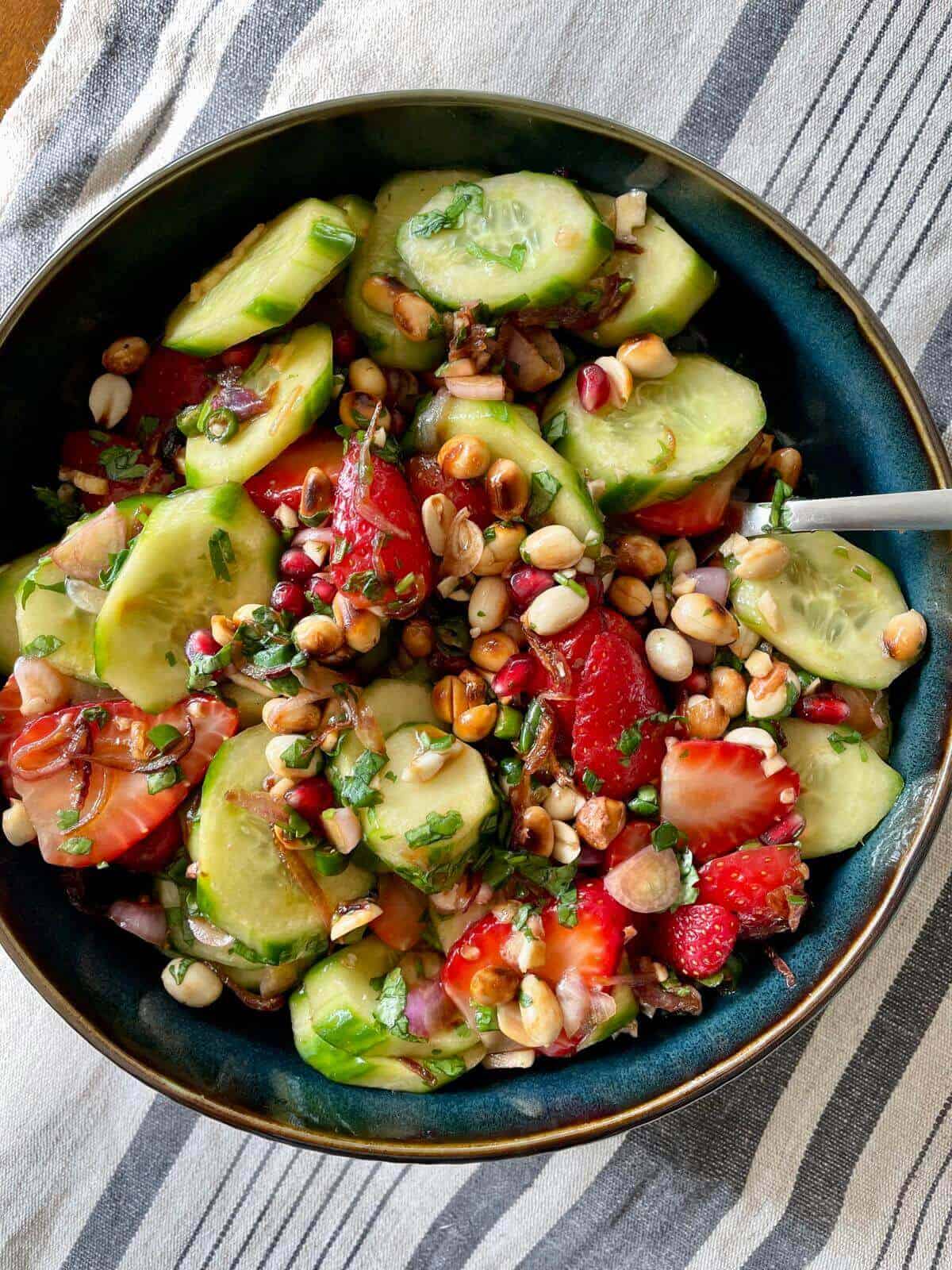 sweet and sour cucumber salad with strawberries