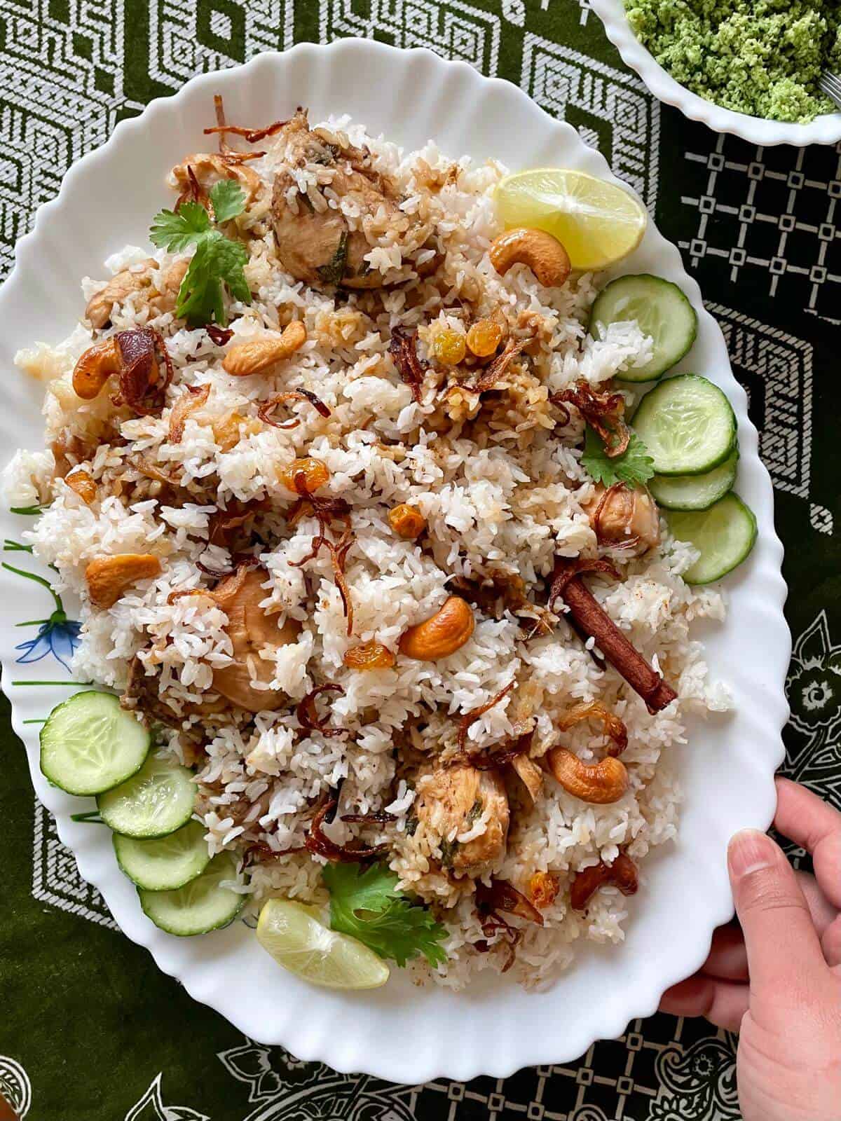 a platter of thalassery chicken dum biryani