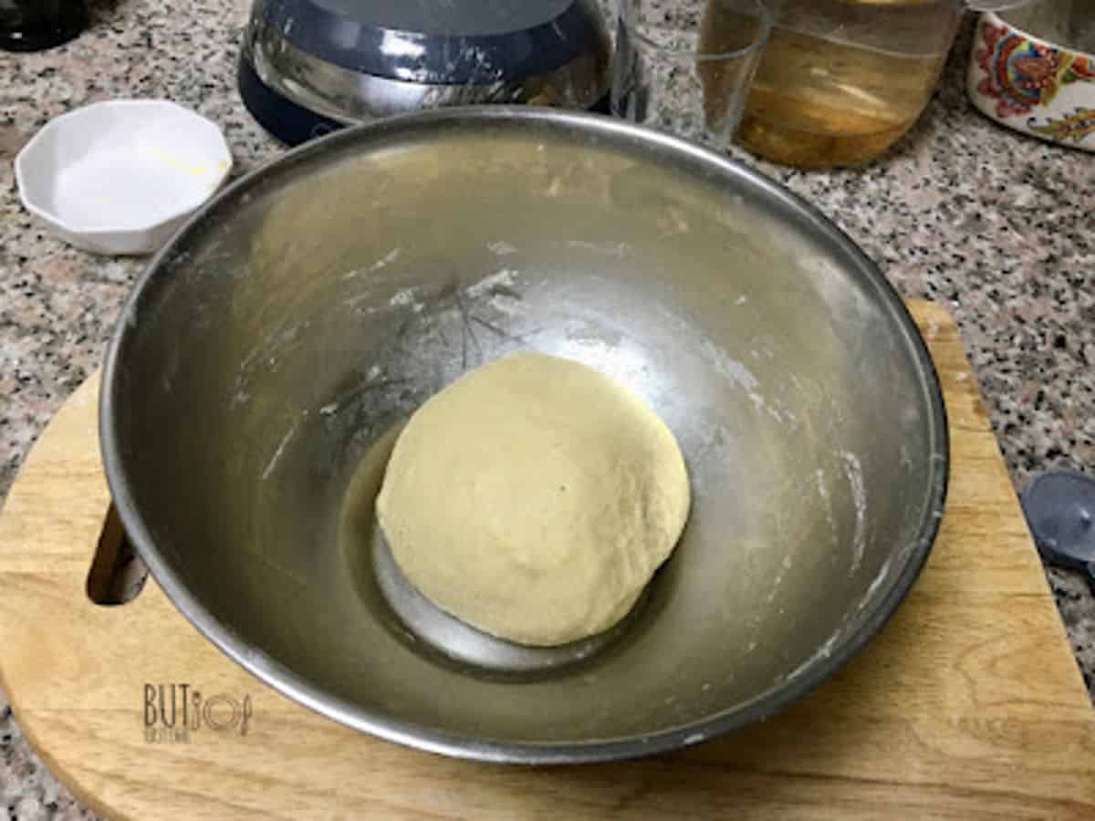 kneaded dough in a bowl.