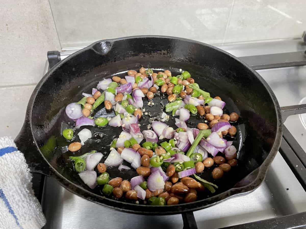 Kanda or onion being sauteed with other ingredients