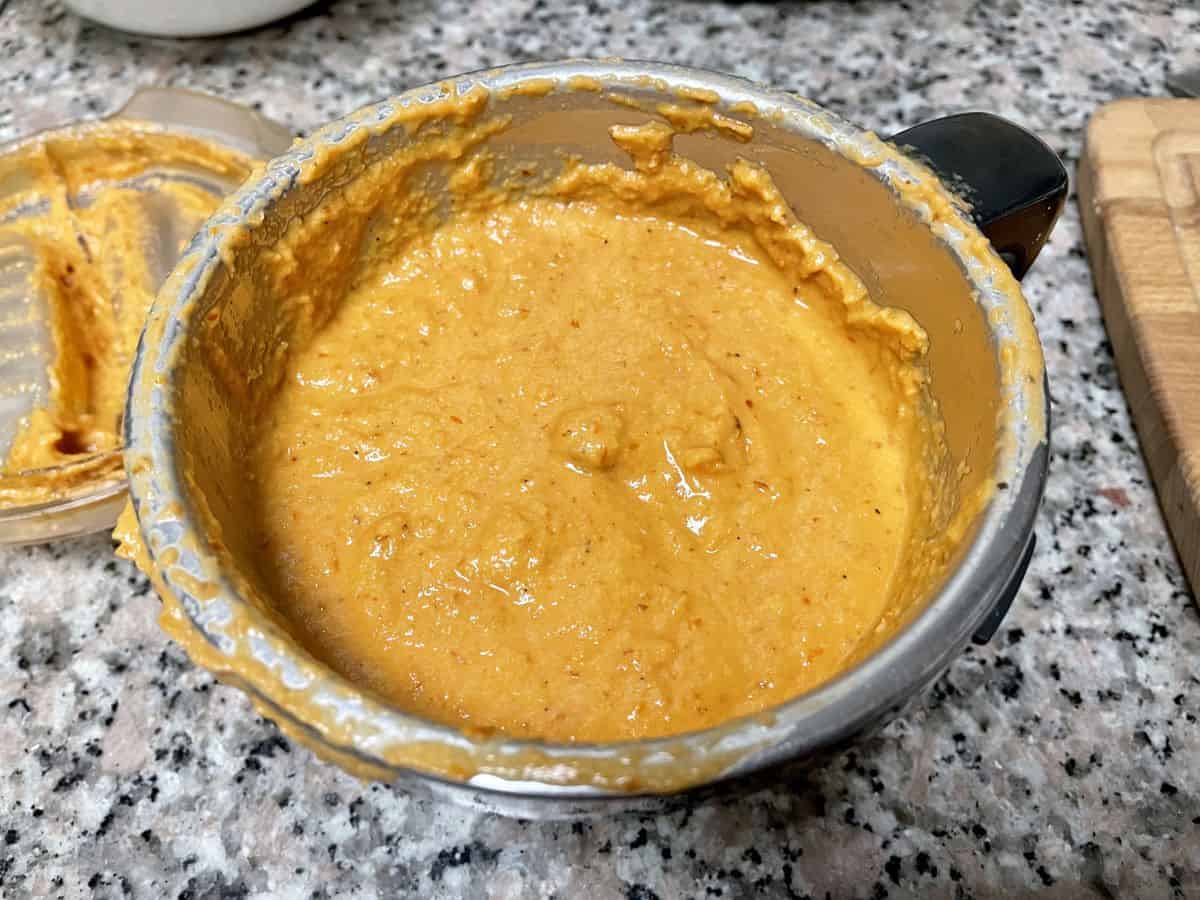 Coconut tomato mixture blended to smooth paste.