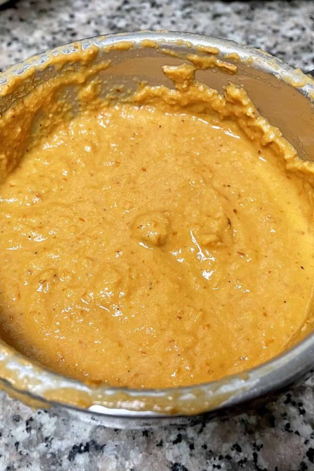 Coconut tomato mixture blended to smooth paste.