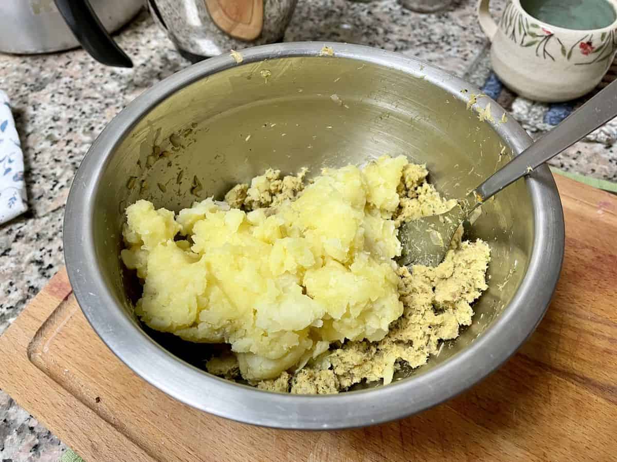 mashed potato over tuna mixture.