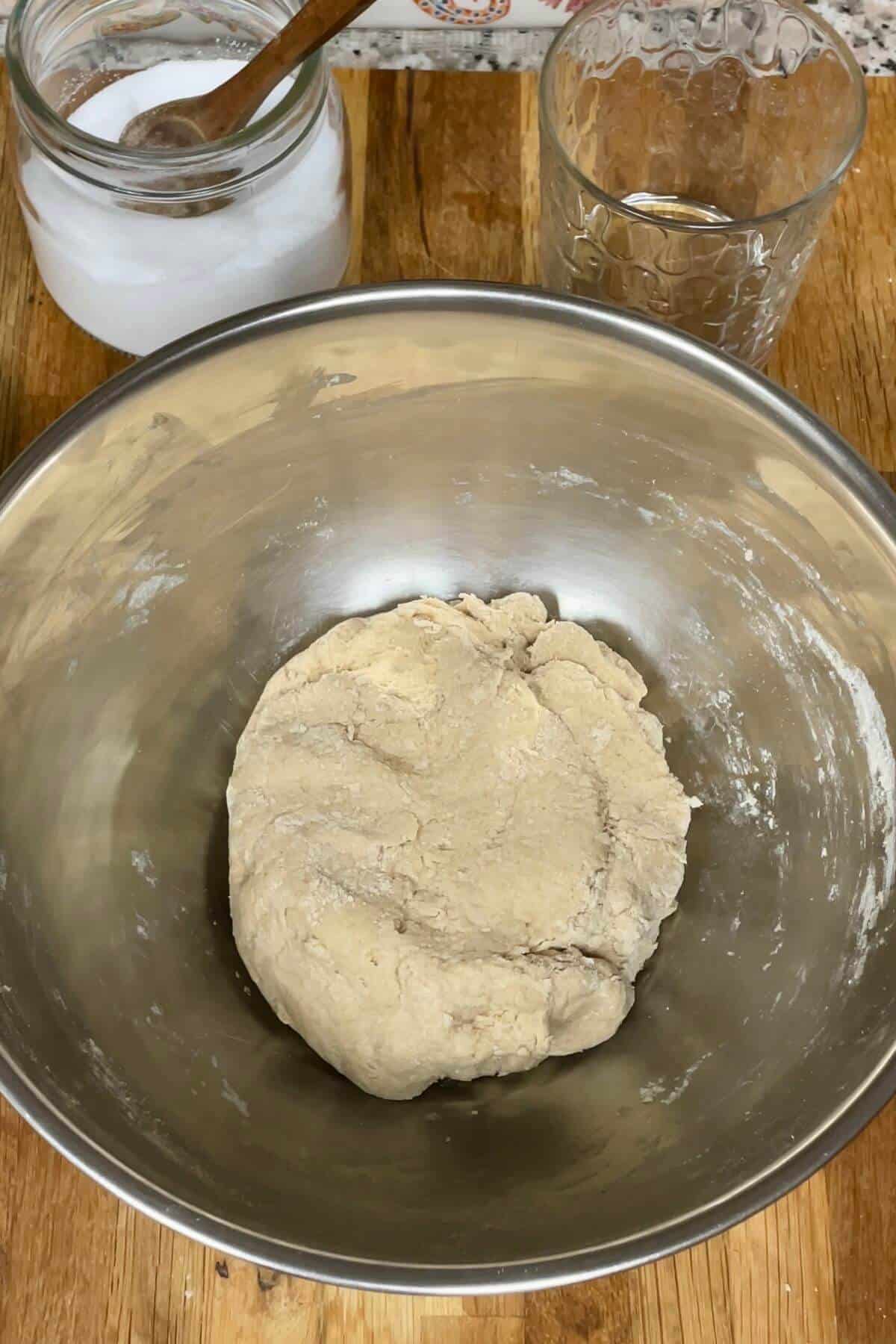 A bowl of wheat flour dough.