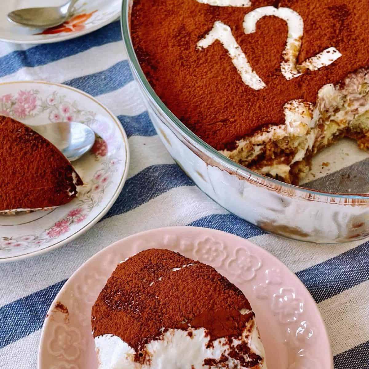 Tiramisu with cream cheese served in dessert plates.
