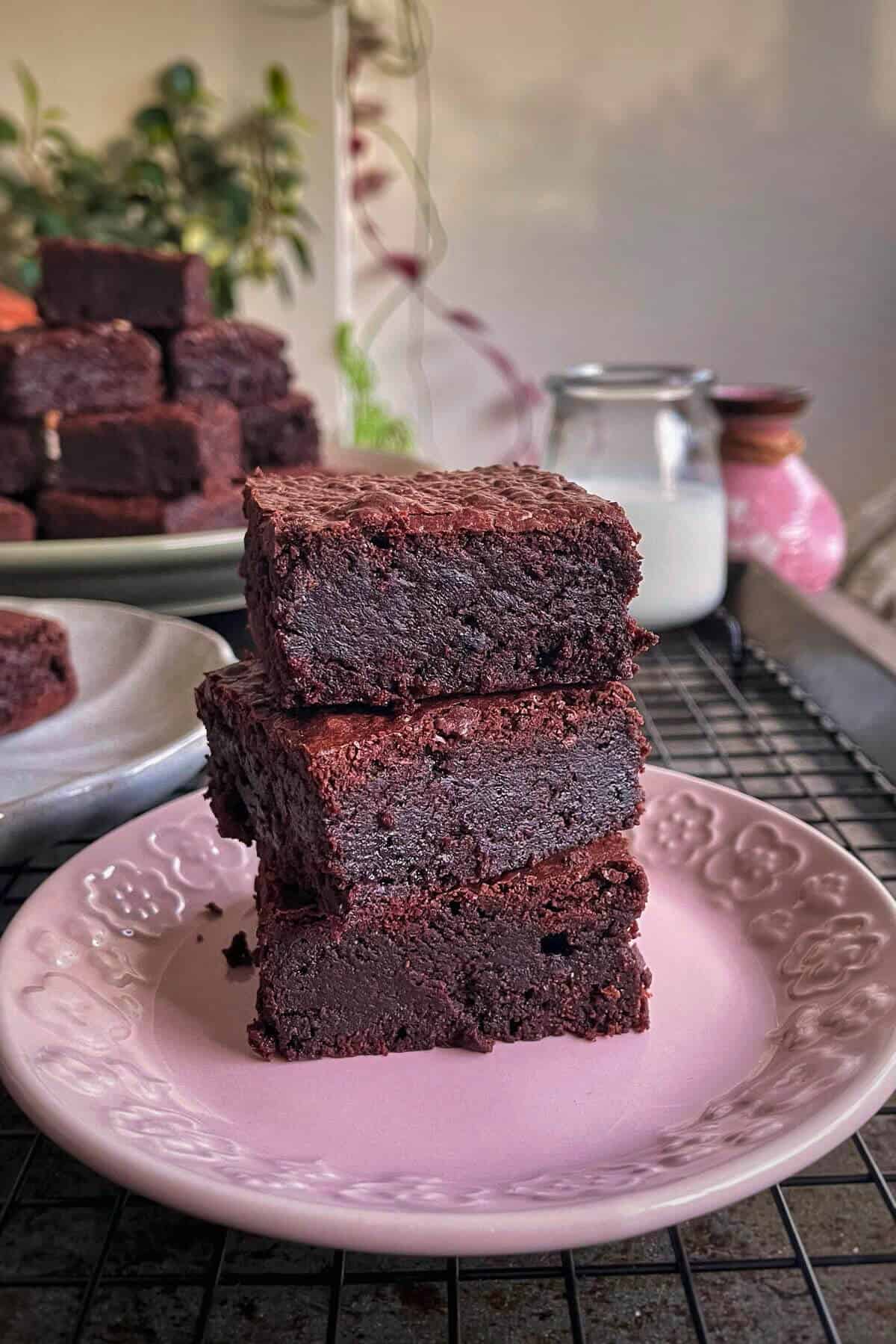 A stack of fudgy double chocolate brownie bars.