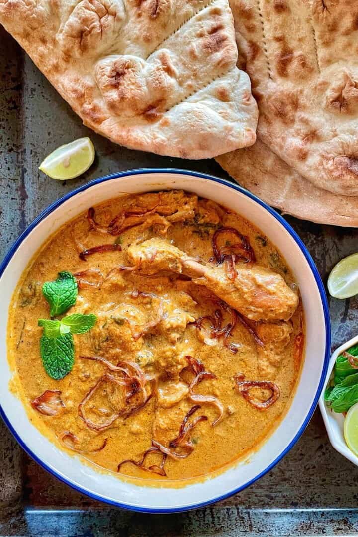 Chicken curry served with naan.