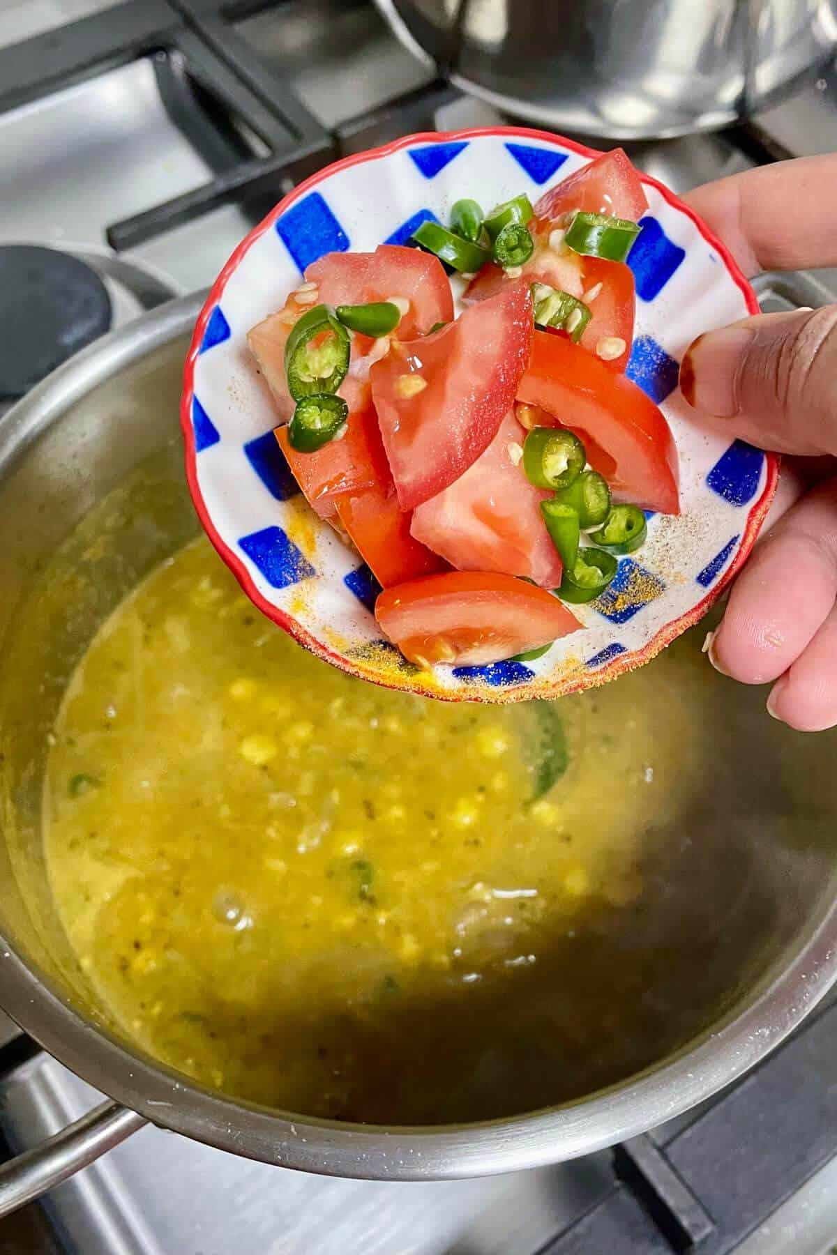 Chopped tomatoe and green chillies.