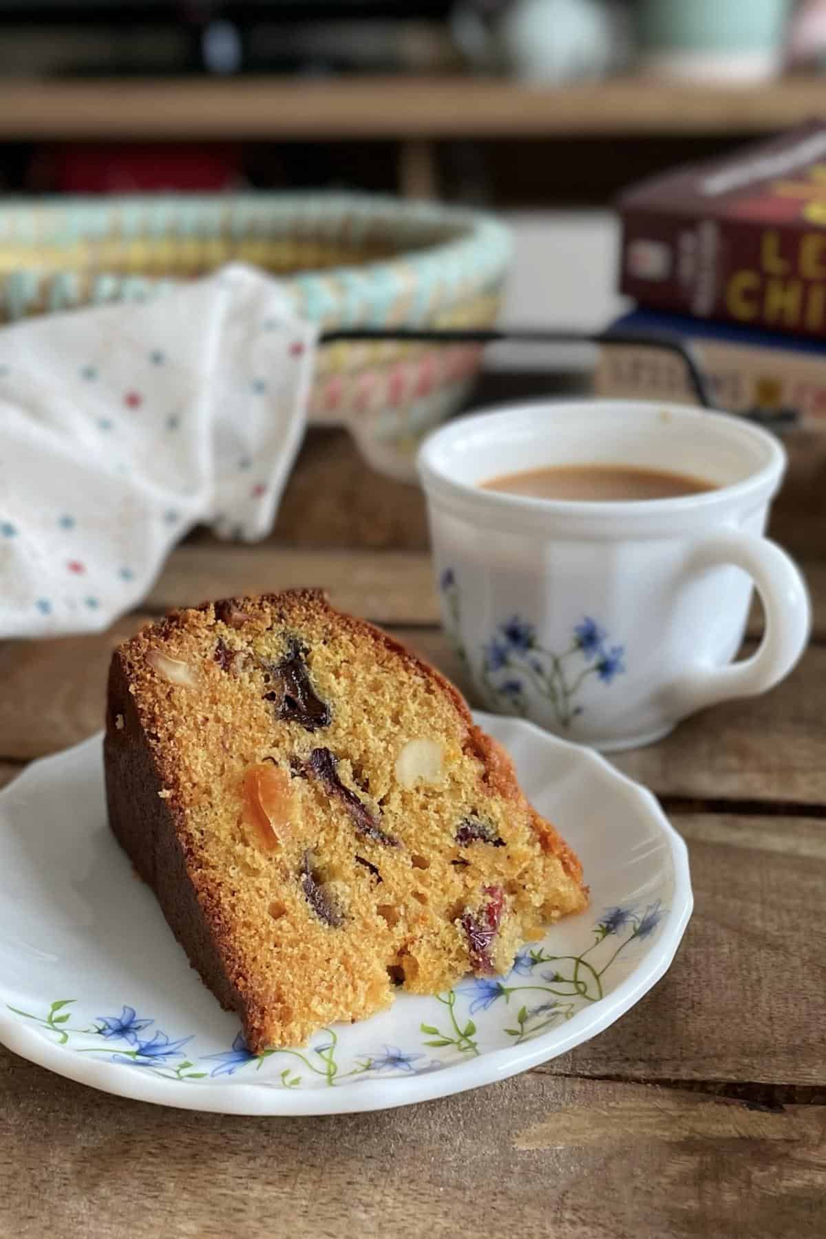 A piece of kerala plum cake with a cup of chai.