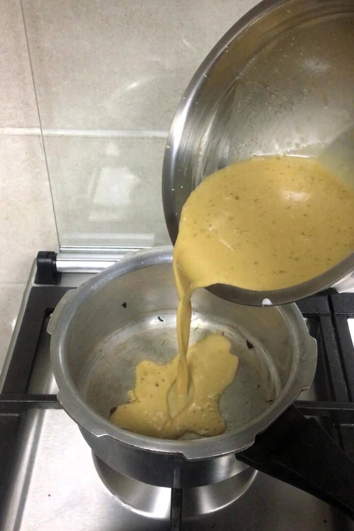Pouring the batter into hot pot.