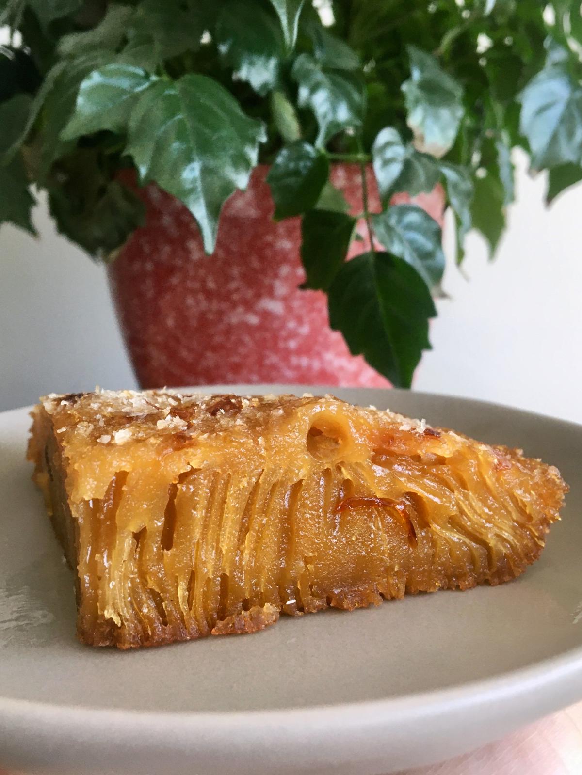 A slice of Kalathappam in a plate.