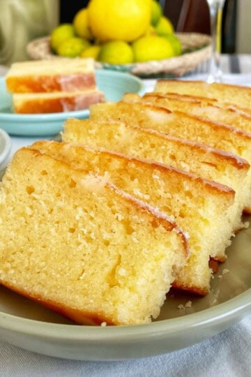 Slices of French lemon yoghurt cake in a oval dish.