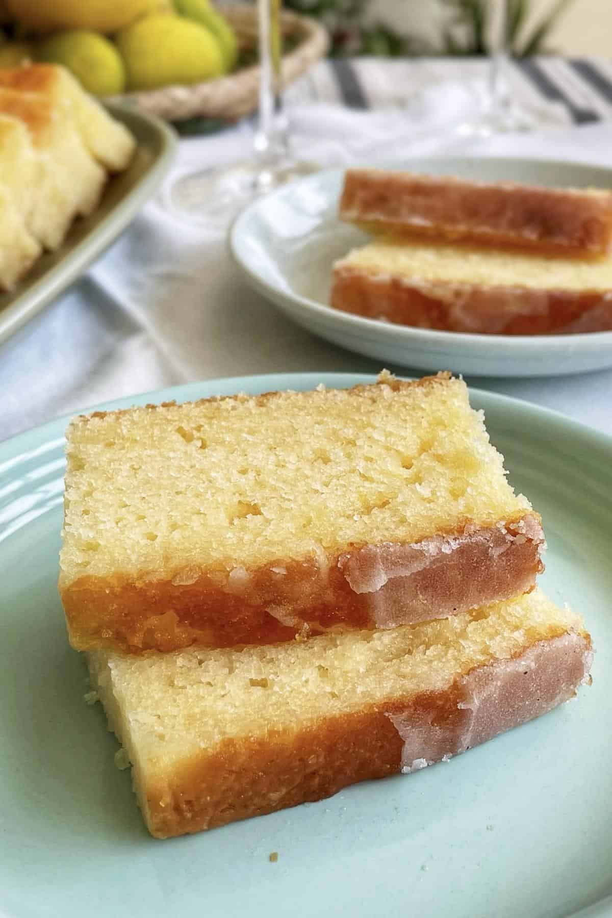 Two french yoghurt cake in a dessert plate.
