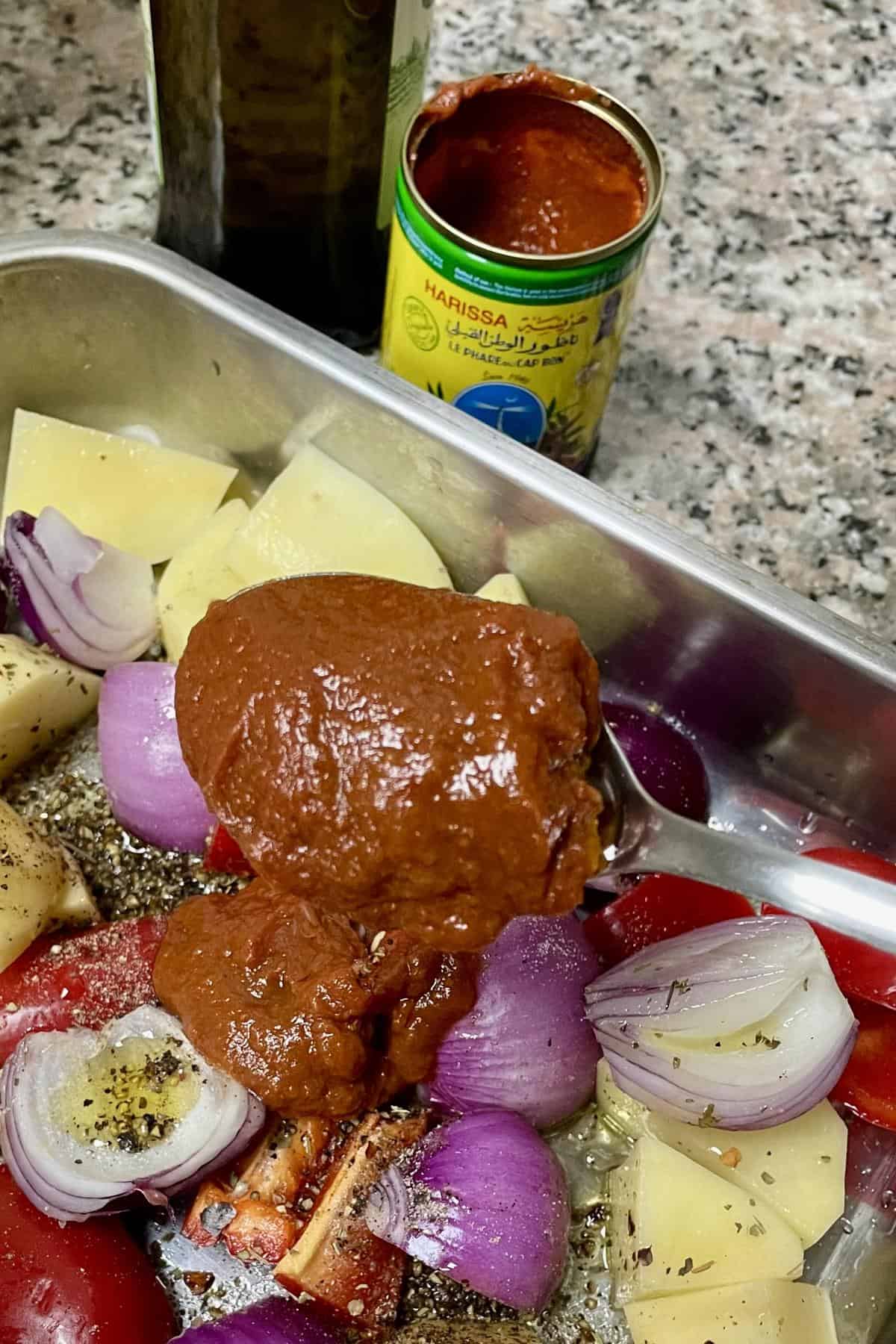 Harissa paste in a spoon