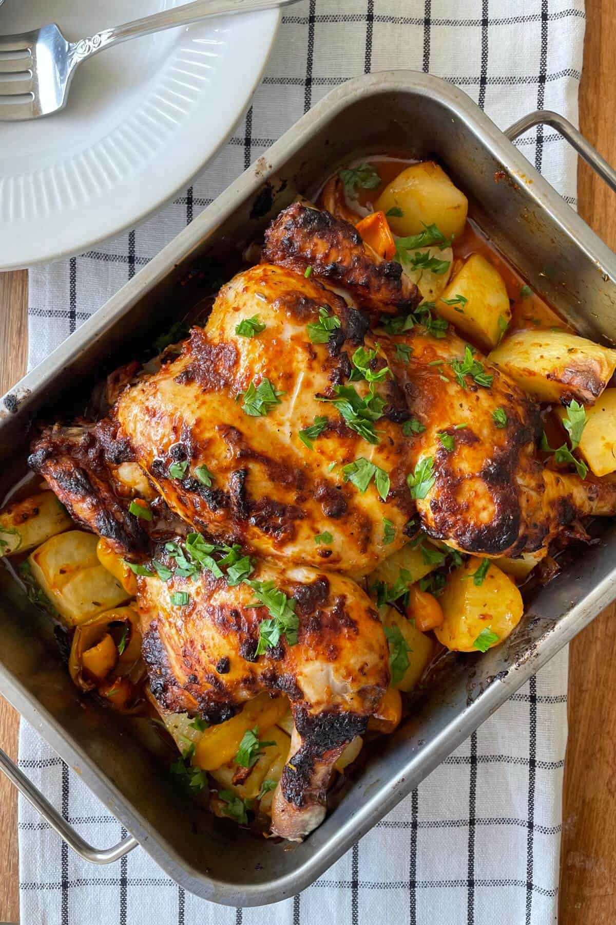 Harissa chicken roasting tin bake with potatoes.